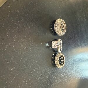 Cubic zirconia rings.  Approx 6-61/4.